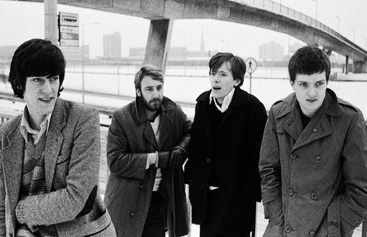 Байопик из 2000-х, вечная бедность и фанатеющий Джордж Майкл. 10 фактов о Joy Division